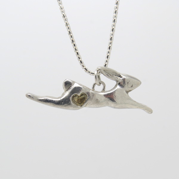 Silver jumping hare necklace.