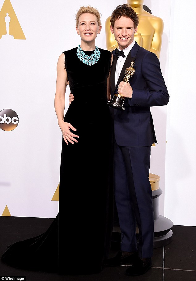 Winner: They posed for photos with the statuette after leaving the stage