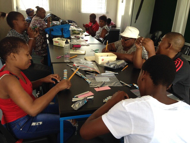 Myself Project benefitors producing upcycled fashion accessories