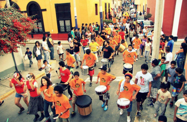 John Fallaque Our Batucada walking through the streets of Alto Peru