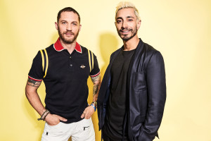 Tom Hardy And Riz Ahmed At Comic Con Wallpaper