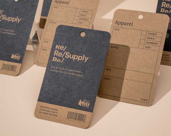 Custom clothing tags showing brand styles.
