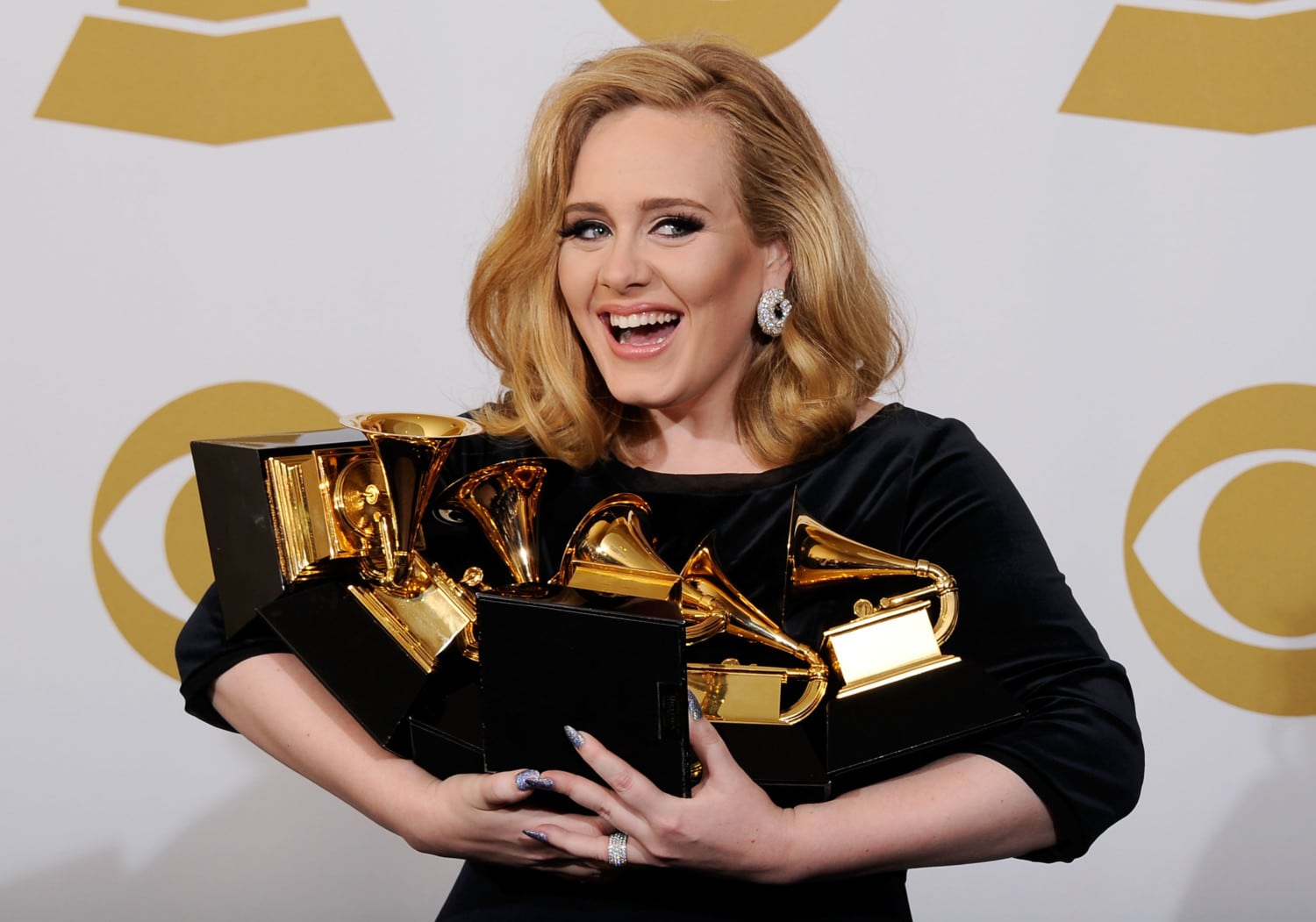 The 54th Annual GRAMMY Awards - Press Room by Kevork Djansezian / Getty Images Entertainment Adele photo
