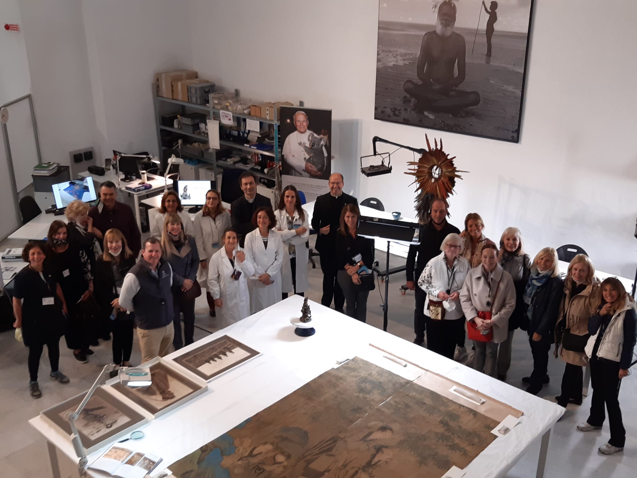 The group pictured with Fr Kevin Lixey, L.C., Fr Mapelli and Romina Cometti during a special stop at Ethnological Materials Conservation Laboratory the heart of the Anima Mundi Ethnological Museum.