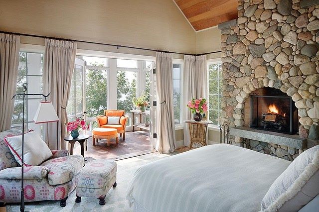 Bedroom With Fireplace & Patio Room the mix of color & fabric is a great idea for this bedroom design.
