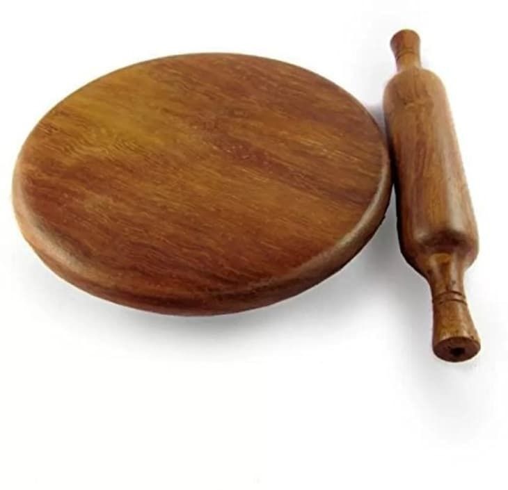 wooden rolling pin and board