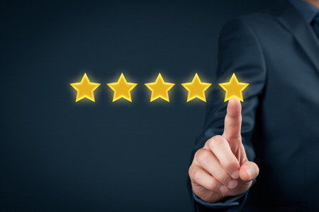 Review, increase rating or ranking, evaluation and classification concept. businessman click on five yellow stars to increase rating of his company.