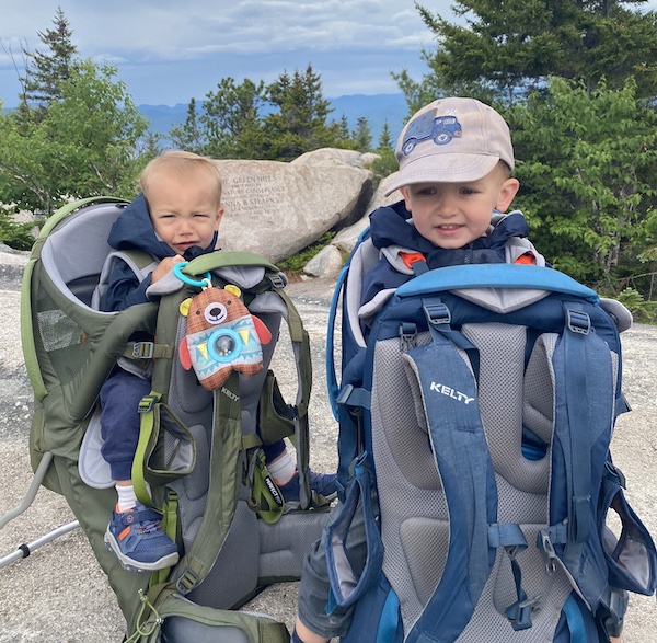 My two toddler boys each in a Kelty Journey Perfectfit Carrier 