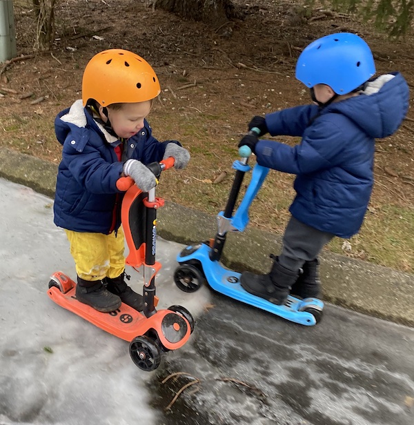 Two Skate Helmets on toddlers