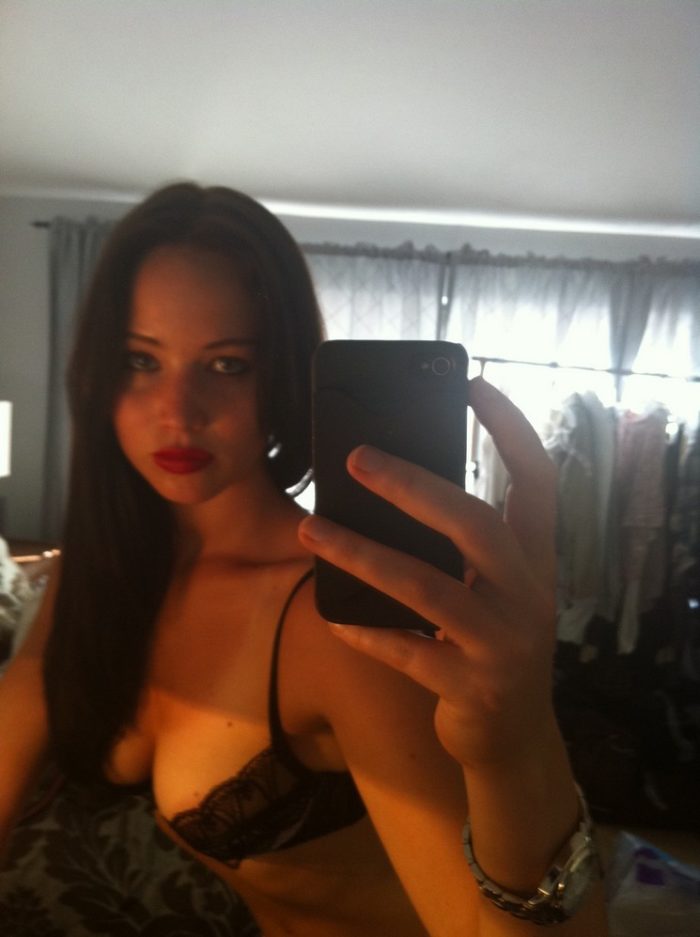 Jlaw takes a pic of herself with dark hair and black bra