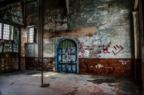 old building interior with graffiti