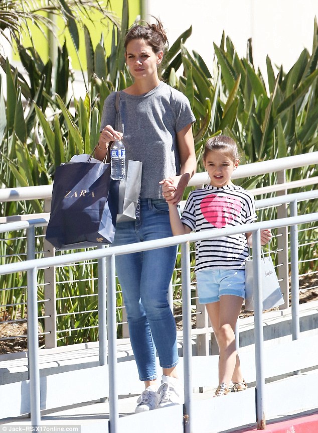 Secrets: The newest addition to Showtime's Ray Donovan moved to LA mainly because of Jamie but she has yet to introduce him to her eight-year-old daughter Suri, pictured here with her on Monday