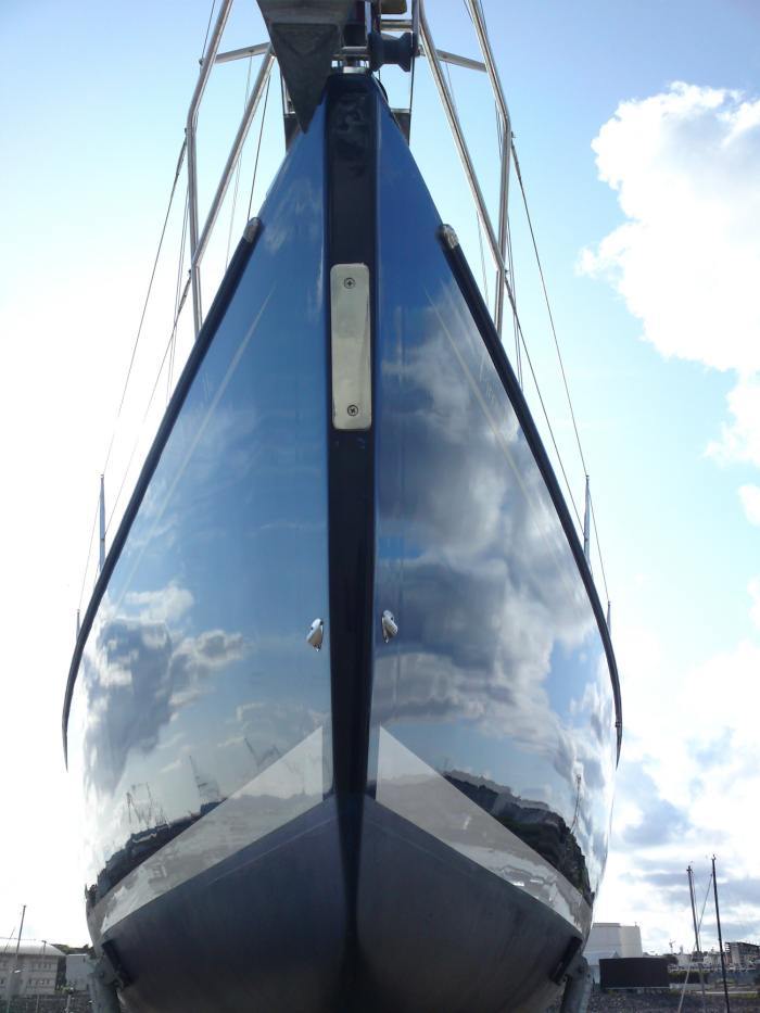 A Gelcoat Restoration Enhancing the Hull of This Yacht Well Beyond Factory New FInish