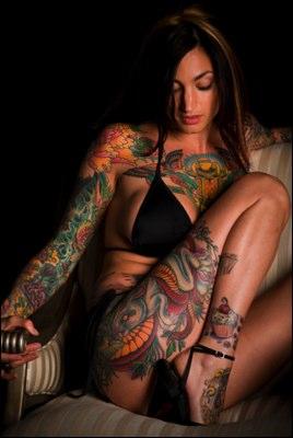 Woman with many tattoos