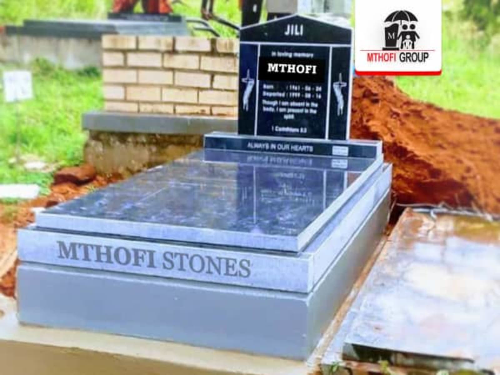 Grey-Dark Granite House tombstone in 37 Esther Roberts Road