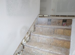 The stairs after mud and texture. The mudded-in step lights are looking good.