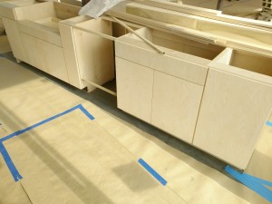The kitchen island being installed.