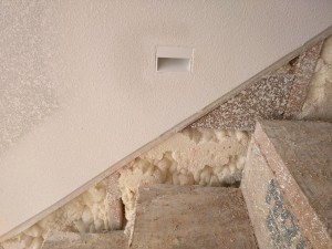 The trimless step lights are from WAC Lighting (WL-LED100TR). These are LED lights that fit into a standard junction box and are mudded into the wall leaving a look so clean you can eat off of it.