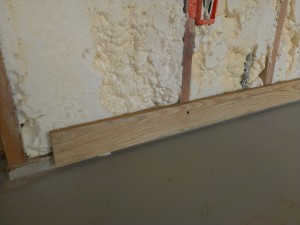 The drywall stops at the board.