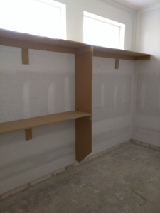 Hanging rods (without rods) in the master closet.