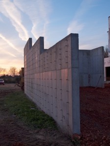 Grading around the courtyard wall.