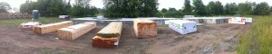 Lumber was delivered. Trusses are stacked up in the background on the left.
