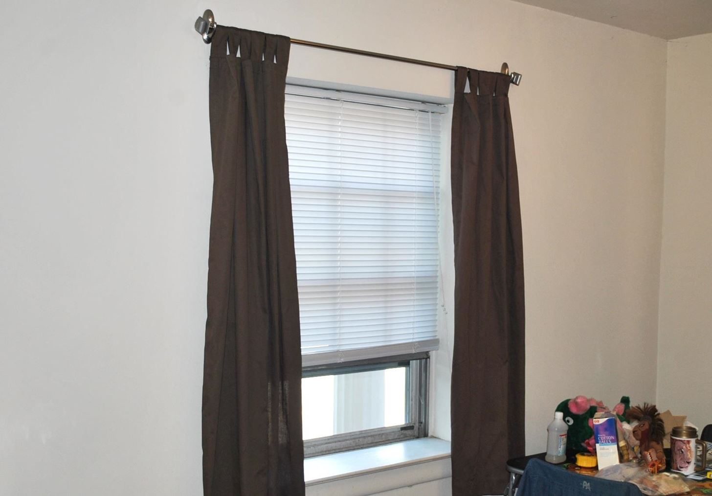 How to Hang Curtains Without Making Holes in the Wall