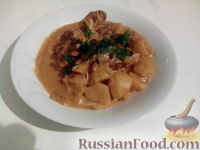 Фото к рецепту: Кролик тушеный с картошкой и сыром Фото к рецепту: Кролик тушеный с картошкой и сыром