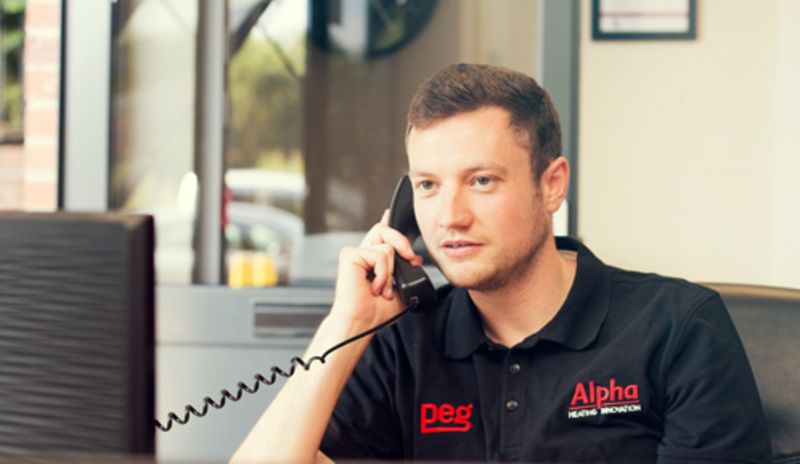 PEG Team member on phone
