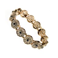 Bratara pe elastic, cu flori metalice