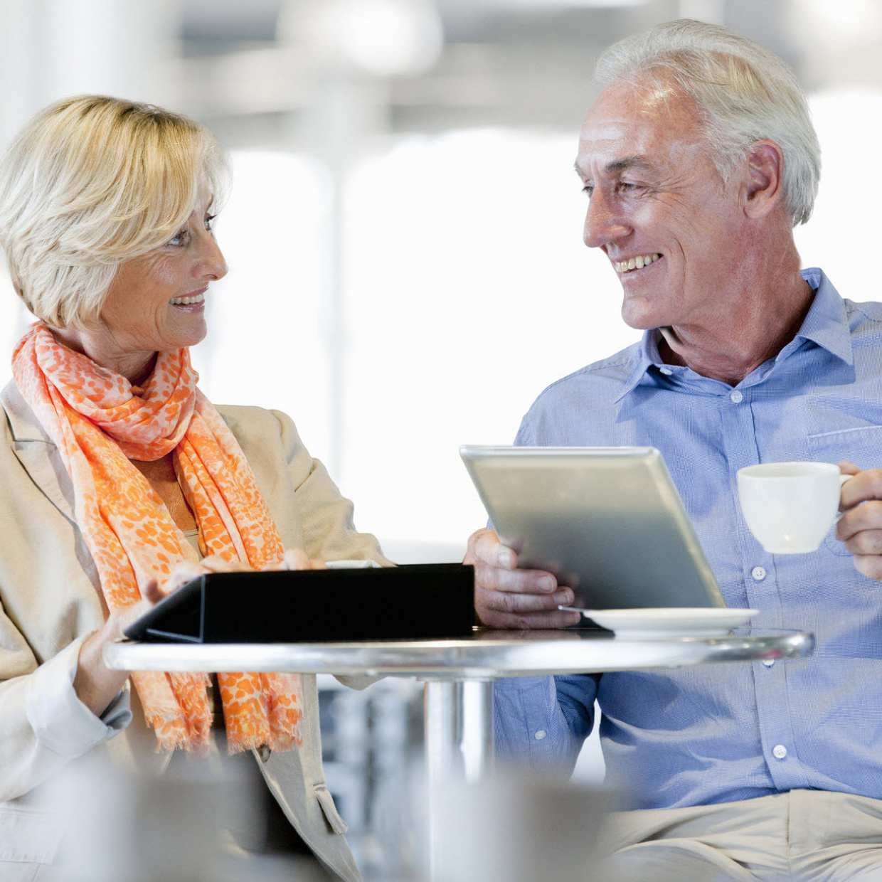 Getty Stock Images Round 2Lifestyle for financial articles Couple with documents and Computer GettyImages-183742226_1226x1226 DW.jpg901C 901183742226; 183742226; Smiling couple using digital tablets at cafe tableSquare CropGetty Images