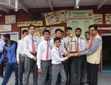 DAVSKVB Clinched Canvas Cricket Trophy.