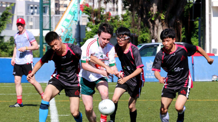 BDIC players (black & red) made history at the 2015 All China GAA Games in Hong Kong where they became the first ever all-Chinese Gaelic Football team took play in the event.