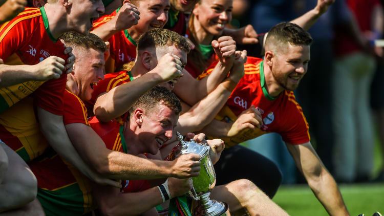 The Carlow hurlers celebrate their Joe McDonagh Cup Final victory over Westmeath.