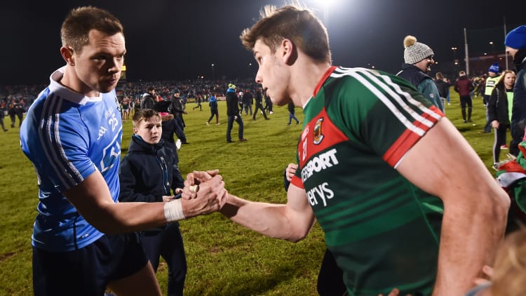 Dean Rock and Lee Keegan shake hands after the game.