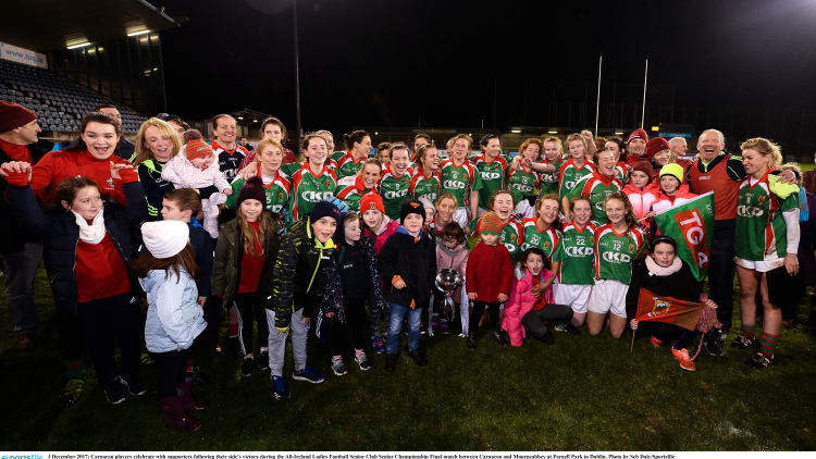 Carnacon players and supporters celebrate at Parnell Park.