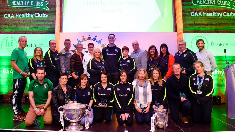 Dublin footballer Brian Fenton pictured with some of the 'Hero Award' winners at Croke Park.