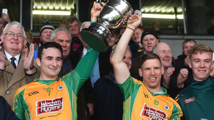 Alan Burke and Ciaran McGrath with the Frank Fox Cup following the 2016 Galway SFC Final.