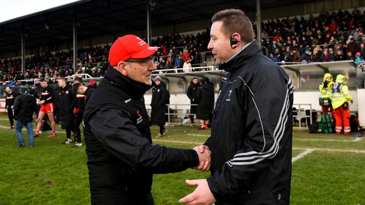 Mickey Harte and Cian O Neill following the game in Newbridge.