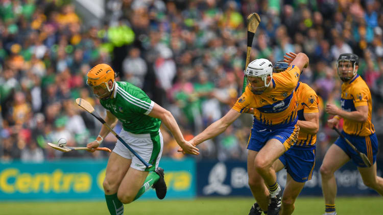 Seamus Flanagan, Limerick, and Conor Cleary, Clare, in Munster Senior Hurling Championship action at Cusack Park, Ennis.