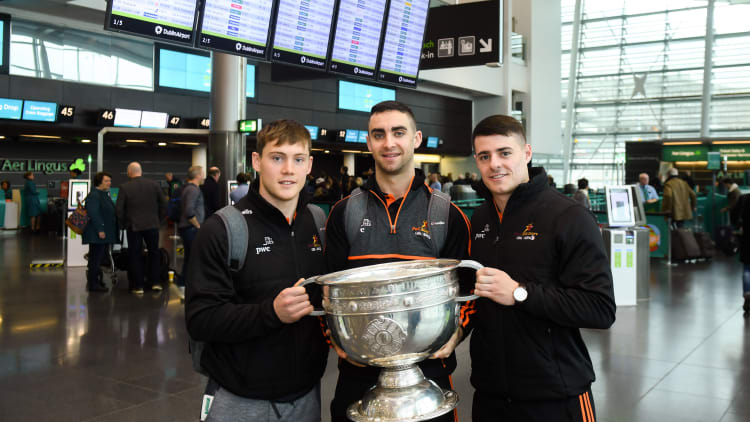 Dublin players, from left, Con O'Callaghan, James McCarthy and Brian Howard with the Sam Maguire Cup at Dublin Airport prior to their departure to the PwC All Stars tour in Philadelphia, USA.