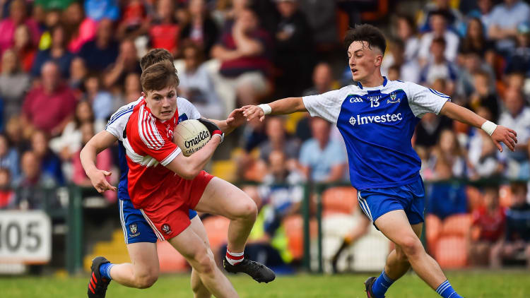 Ethan Doherty, Derry, and Brendan Og O'Dufaigh and Donnach Swinburne, Monaghan, in action at the Athletic Grounds.