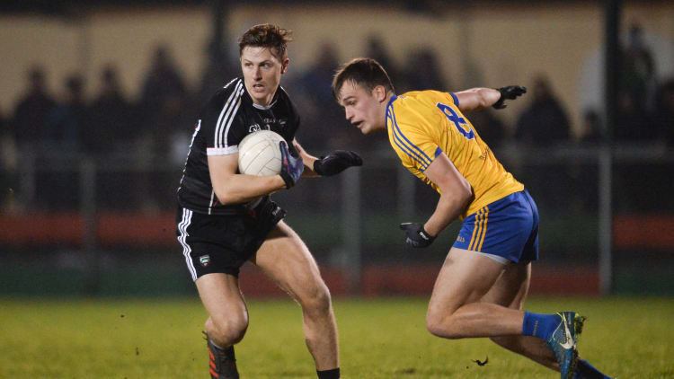James Clare, Sligo, and Enda Smith, Roscommon, during the Connacht FBD League clash at Kiltoom.