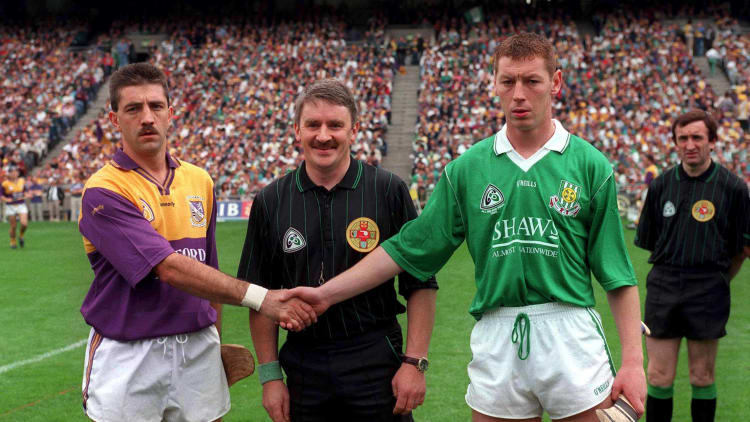Martin Storey and Ciaran Carey with referee Pat Horan before the 1996 All Ireland Hurling Final.