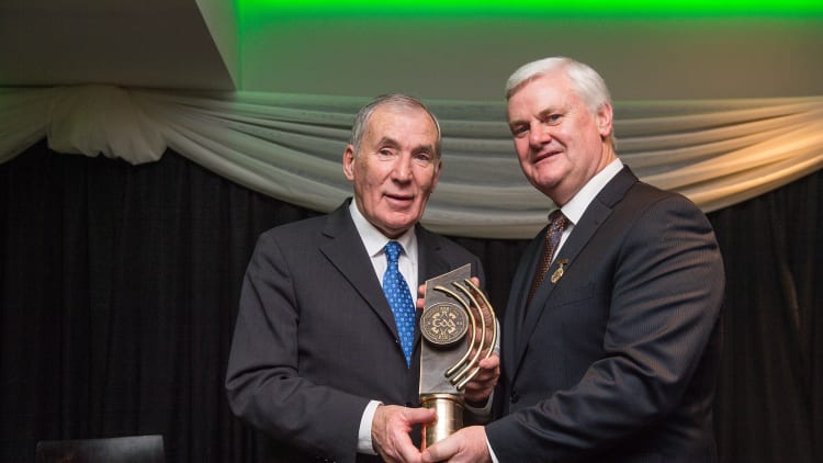 Weeshie Fogarty (l) presented with his MacNamee Hall of Fame Award by former Uachtarán Chumann Lúthchleas Gael, Aogán Ó Fearghail, in 2016.