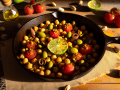 Oven-Baked Chickpeas with Cherry Tomatoes, Olives, and Pistachios