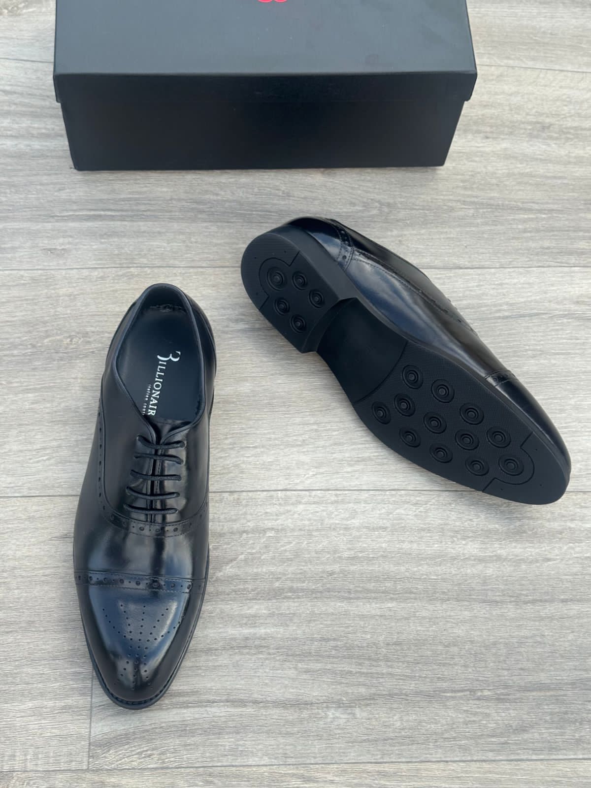 Billionaire office shoe's black