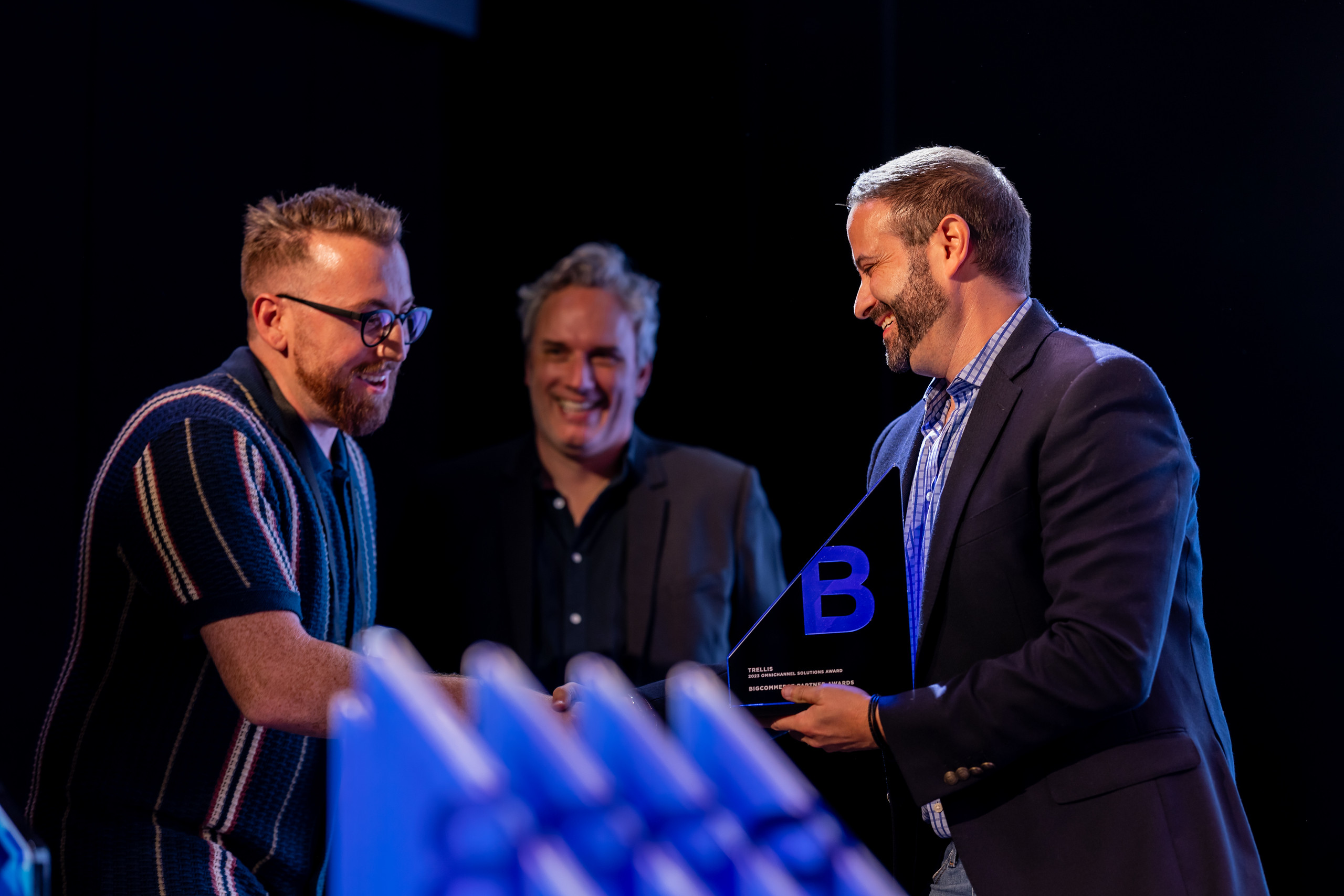 Jared Shaner, Chief Revenue Officer at Trellis, proudly receives the Omnichannel Solutions Award at the BigCommerce Partner Summit 2024.