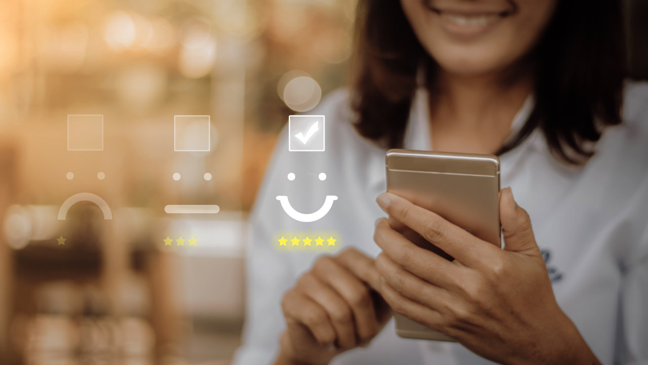 Happy customer giving a 5-star review on the mobile website or an app