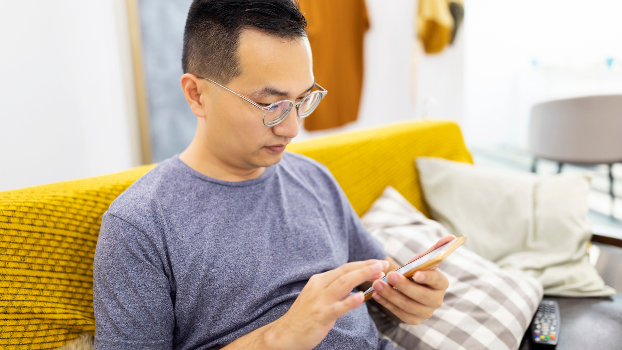 Improve communication with your customers - Person browsing on his phone
